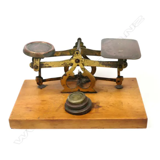 A Brass ‘Roberval Letter Scale, mounted on a simple plain timber base