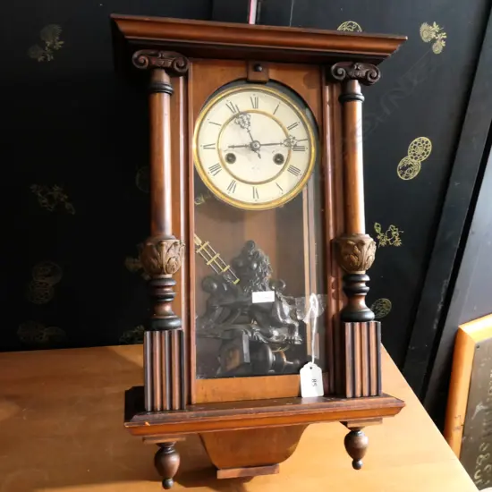 (H34)  GERMAN WALL MOUNTED STRIKING CLOCK. WALNUT CASE...