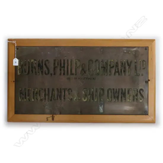 BRASS BUILDING SIGN 'BURNS PHILP & Co. LTD. MERCHANTS & SHIP OWNERS'. IN RIMU FRAME 740 x 410mm