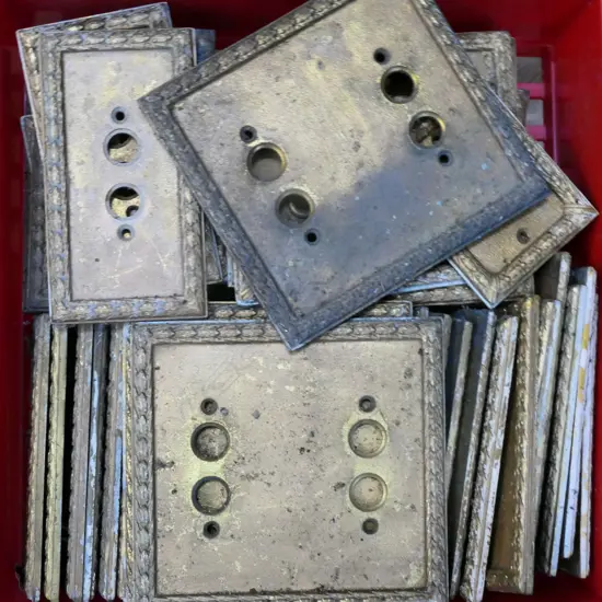 BOX OF BRONZE PUSH BUTTON LIGHT SWITCH FITTINGS, EX RITZ HOTEL, LONDON.