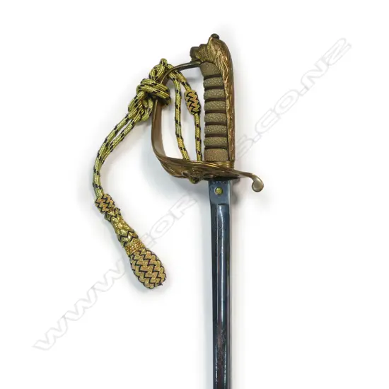 Royal Naval Reserve 1827 Pattern Officers Sword, 32 ½" narrow flat-back blade etched on the ricasso 'Gieves, Portsmouth, London, Edinburgh & Devonport'. Inset proof disc 'P'.