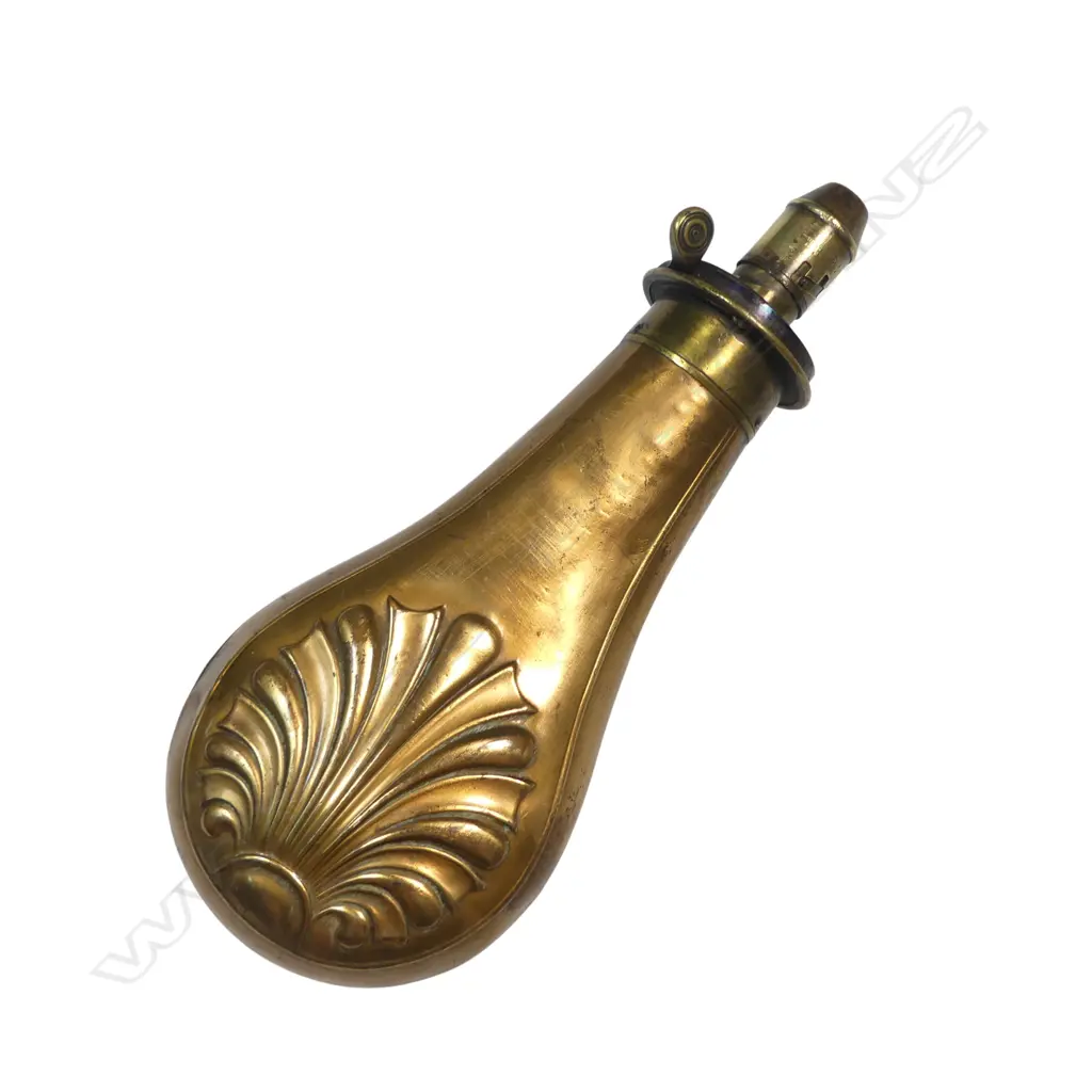 Victorian Dixon & Son Patent copper and brass powder flask of bag shape with graduated dispenser nozzle decorated with a moulded anthemion design. Image 1++
