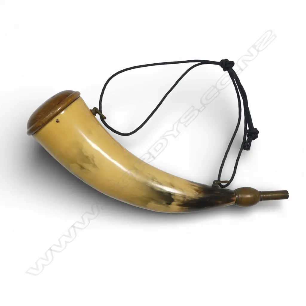 Ox horn powder horn with brass black powder dispenser nozzle. Maker's initials to side 'KRC' and '55' (grains) to nozzle. L.330mm Image 1++