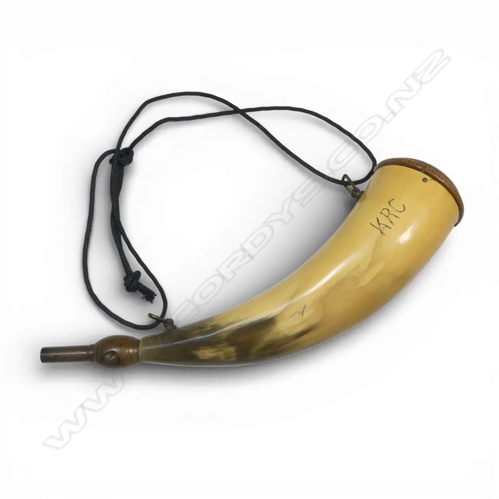 Ox horn powder horn with brass black powder dispenser nozzle. Maker's initials to side 'KRC' and '55' (grains) to nozzle. L.330mm Image 1++