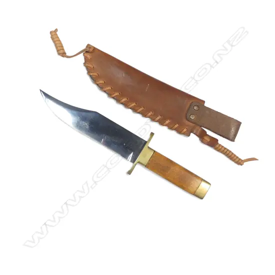 Connecticut Valley Arms (CVA US) clip-point Bowie knife with leather thong stitched scabbard (owners initials stamped),