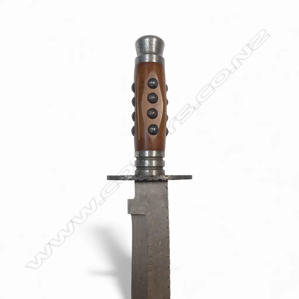 Very Large Bowie Knife with 10" Damascus clip-point blade and Damascus fittings to the swollen cylindrical wooden handle, Image 1++