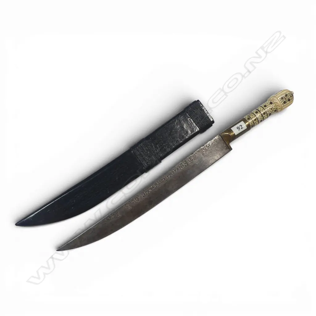 Ivory hilted Ottoman Kandjar Dagger with straight single-edged 10” unfullered blade that has two sections of serrations to back edge and silver inlay both sides, one of Arabic script, Image 1++