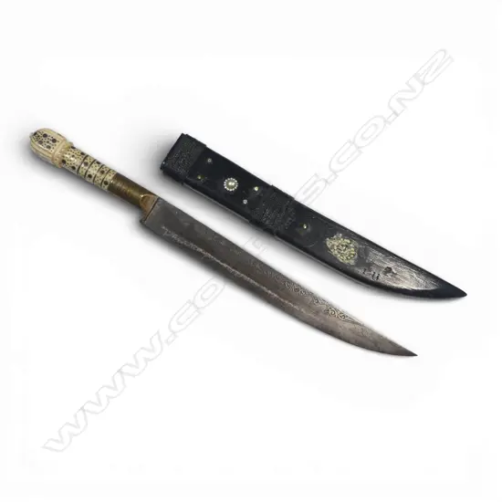Ivory hilted Ottoman Kandjar Dagger with straight single-edged 10” unfullered blade that has two sections of serrations to back edge and silver inlay both sides, one of Arabic script,