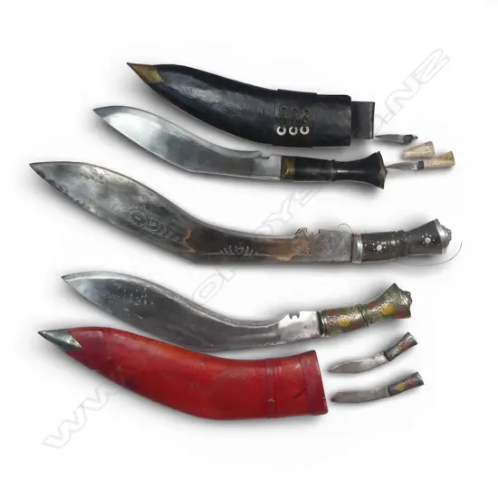 Three Nepalese/Indian Khukri. Two with scabbards, one Nepalese Army pattern (damaged small knife). Longest 490mm