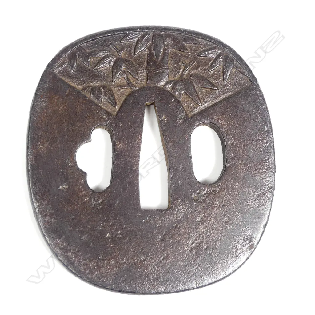 Mid-Edo period Japanese Iron Tsuba sword guard carved with madoe panels depicting plum, bamboo and pine. Signed Masatoshi. With NTKK appraisal papers Image 1++