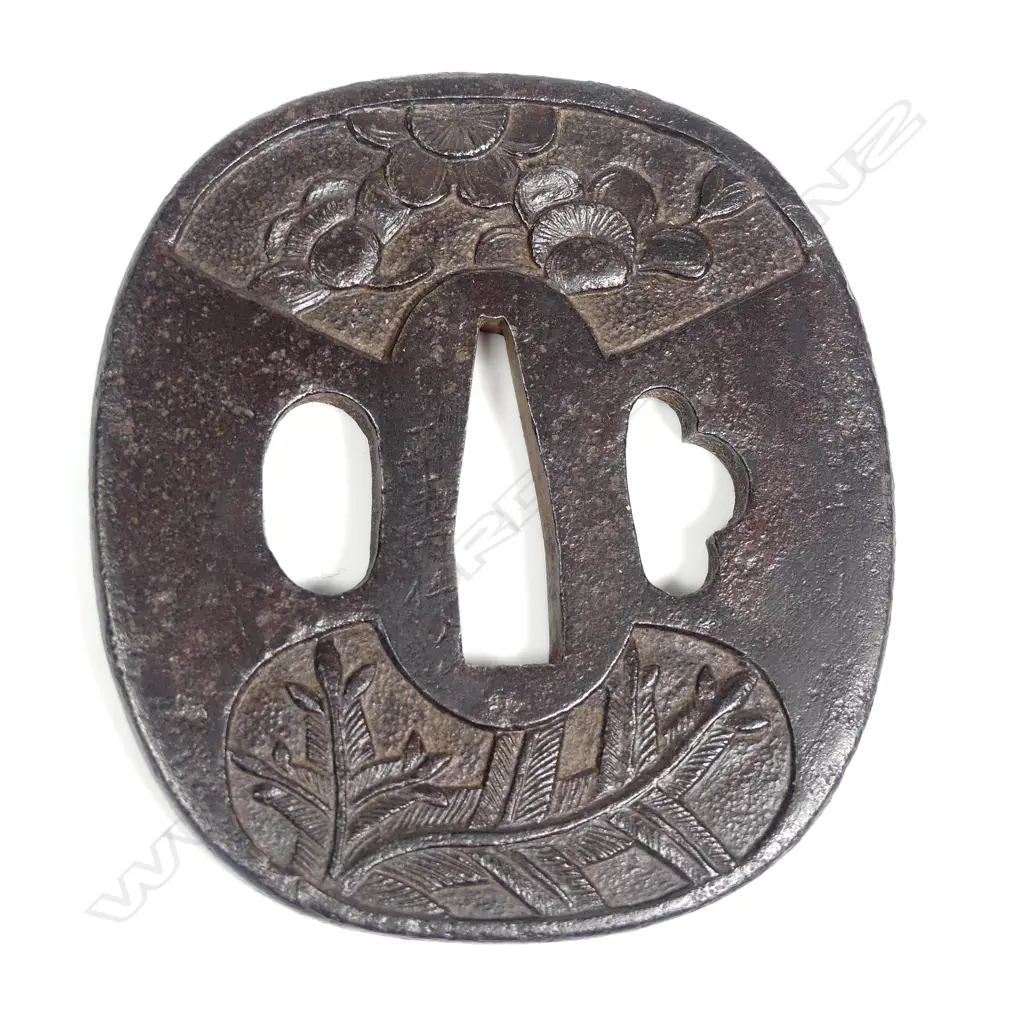 Mid-Edo period Japanese Iron Tsuba sword guard carved with madoe panels depicting plum, bamboo and pine. Signed Masatoshi. With NTKK appraisal papers Image 1++