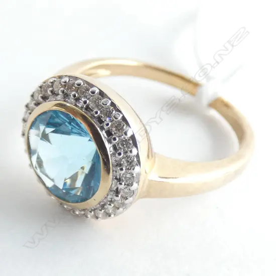 9CT DIAMOND & BLUE STONE RING 3.95gms