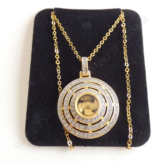 GILT CZ PENDANT WITH BLADE SWIVEL CENTER ON CHAIN