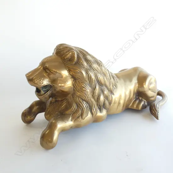 SITTING BRASS LION L.425mm
