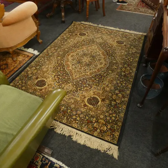 LARGE BLACK WOOL MACHINED RUG...