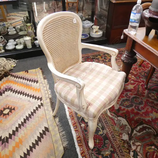 OLD RATTAN BACKED OCCASIONAL CHAIR - CHAIR PAD HAS TEAR  