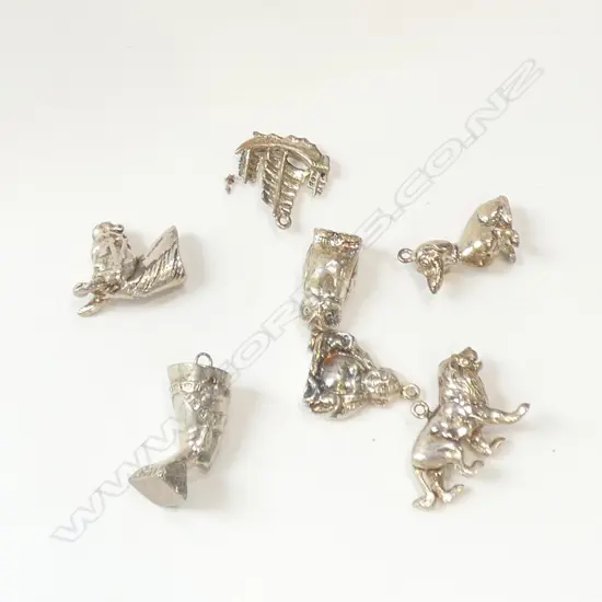 SEVEN SILVER CHARMS 