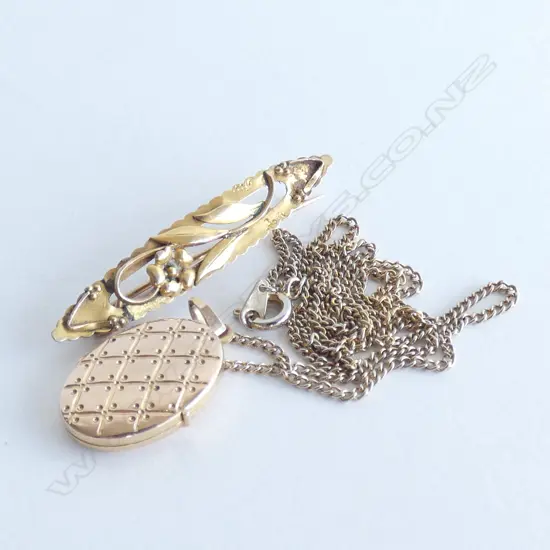 TWO UNMARKED GOLD PIECES