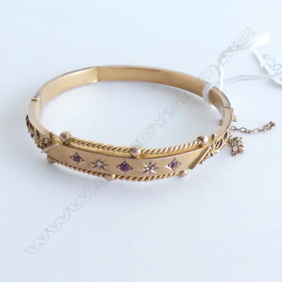 EDWARDIAN 9CT ROSE GOLD RUBY/DIAMOND BANGLE (AF)
