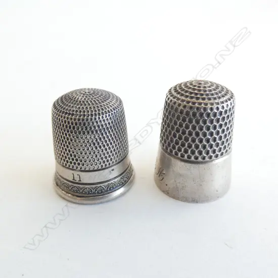2 SILVER THIMBLES