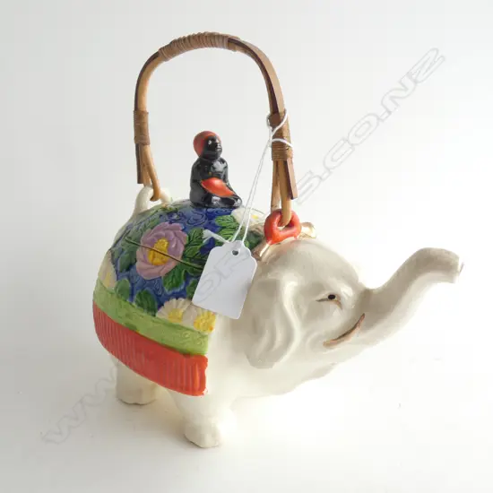 OLD ELEPHANT TEAPOT - BAMBOO HANDLE - DECORATED WITH FLORAL RUG L  200MM