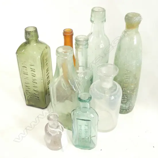 9 VINTAGE BOTTLES 