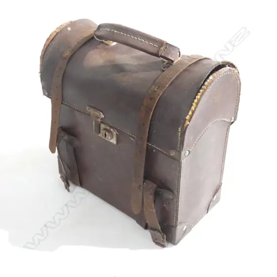 OLD LEATHER CASED LAWN BOWLS SET