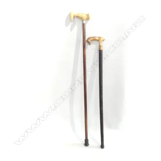 2  OLD WOODEN WALKING STICKS; 1 BRASS HORSE HEAD HANDLE & ONE CARVED BONE(?)