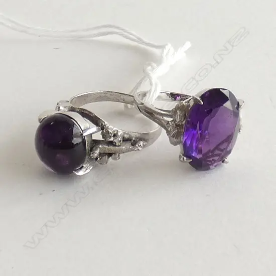 2 STG? RINGS w. PURPLE STONES