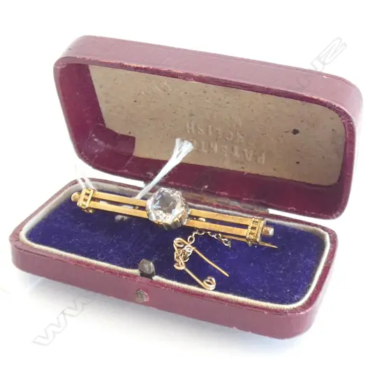 9CT GOLD AND CLEAR STONE BROOCH