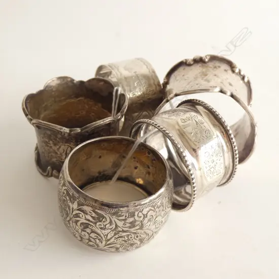 (17757) 5 ASST STG SILVER NAPKIN RINGS