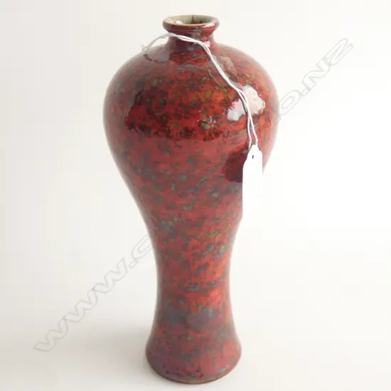 CHINESE PORCELAIN MOTTLED OX BLOOD GLAZED MEIPING VASE. H.220mm