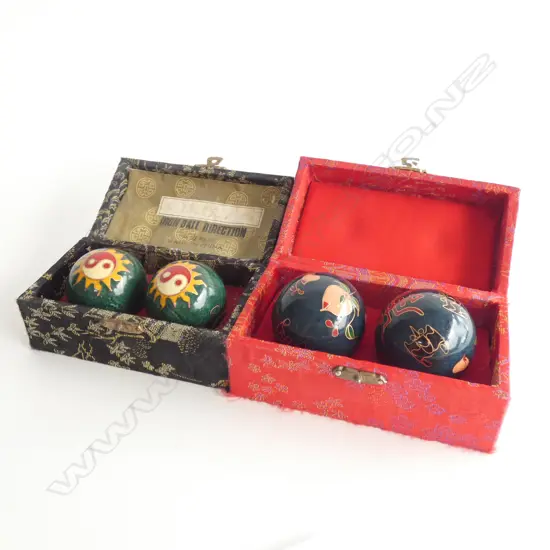 2 CASED SETS OF ORIENTAL CLOISONNE STRESS BALLS