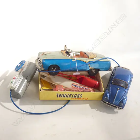 2 VINTAGE TIN PLATE CARS + HELICOPTERS