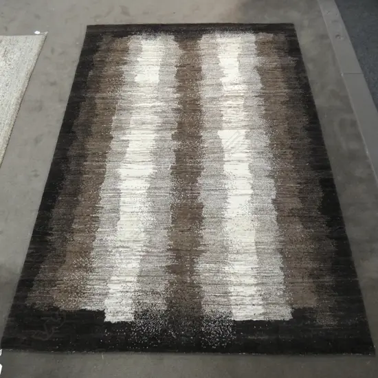 CONTEMPORARY HAND KNOTTED BROWN WOOL PILE RUG...