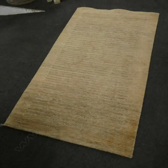 CONTEMPORARY HAND KNOTTED WOOL PILE RUG...