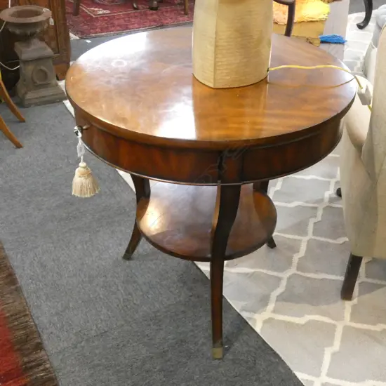 CIRCULAR MAHOGANY TABLE w. TASSELED KEY