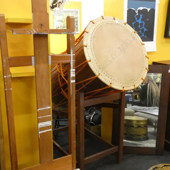 A large Taiko Drum on a hardwood stand