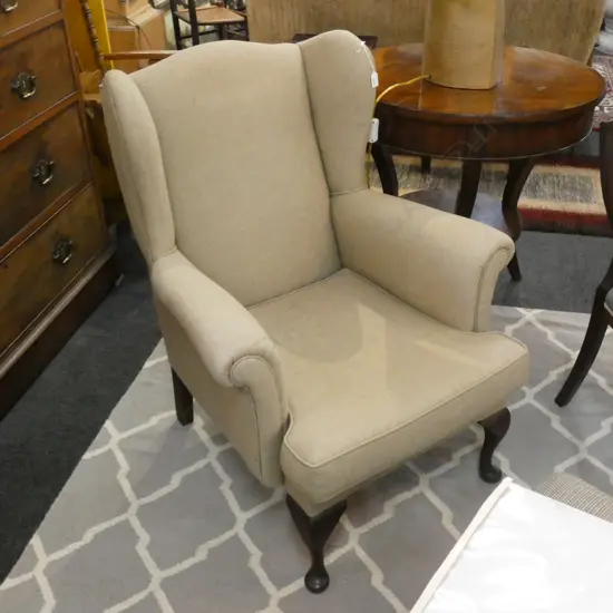 UPHOLSTERED WING BACK CHAIR