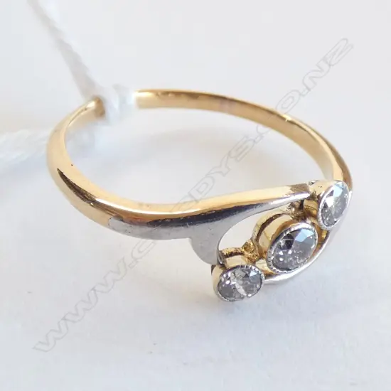 9CT GOLD AND THREE STONE DIAMOND RING
