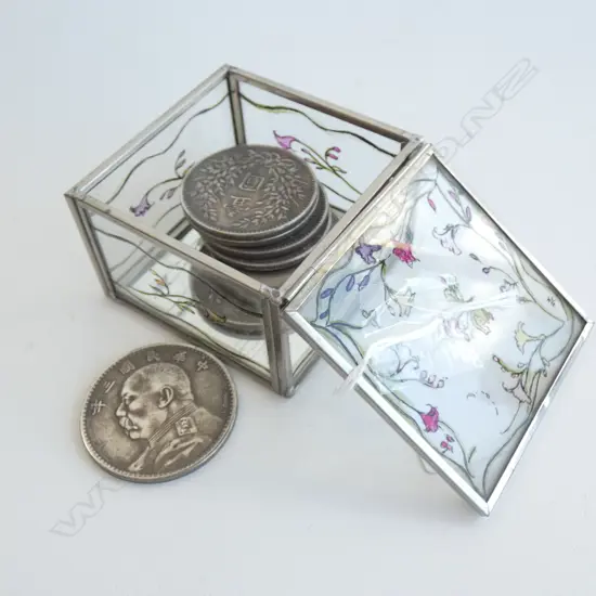 8 CHINESE SILVER COINS IN GLASS BOX 