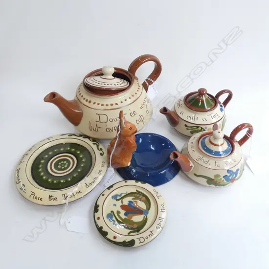 TORQUAY MOTTO WARE; 3 TEAPOTS (LARGEST L 240MM) 2 TEAPOT STANDS & RABBIT ASHTRAY