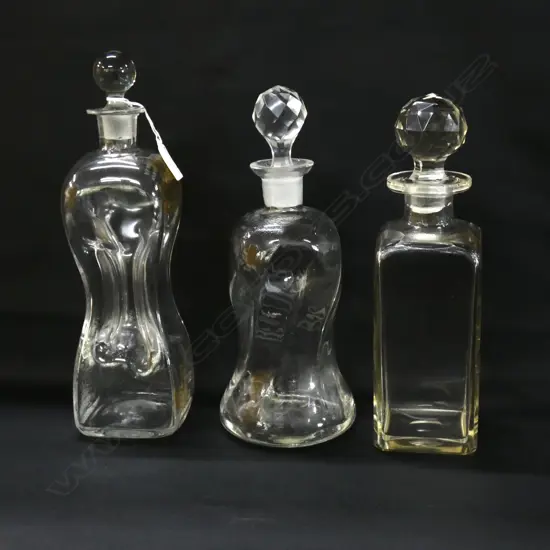 3 WHISKY ADVERTISING DECANTERS; DCL, DEWARS, SANDERSONS H.310mm