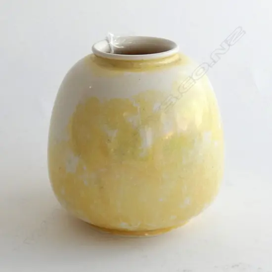 YELLOW RUSKIN OVOID VASE - PATCHY GLAZE. INCISED MARK TO BASE H. 135MM