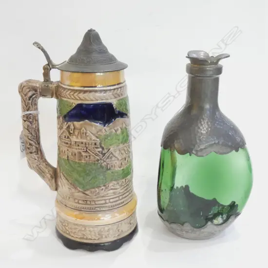 OLD GREEN GLASS & PEWTER DECANTER (H. 230MM) & MUSICAL CHARACTER TANKARD (WORKING) (H. 260MM)