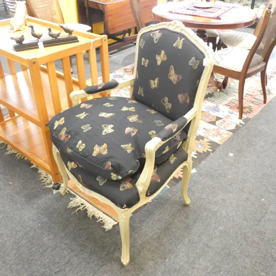 FRENCH STYLE BERGERE CHAIR; BLACK BUTTERFLY UPHOLSTERY