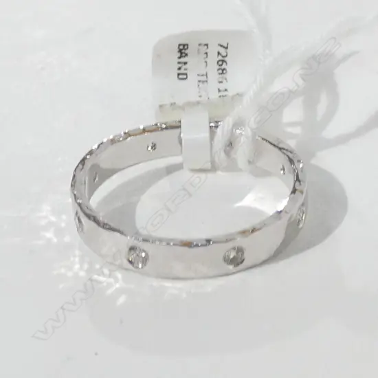 14CT WHITE GOLD AND DIAMOND SET BAND
