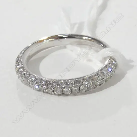18CT WHITE GOLD AND PAVE SET DIAMOND BAND