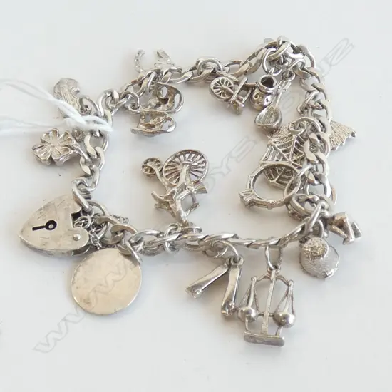 STG SILVER CHARM BRACELET 27 GRAMS