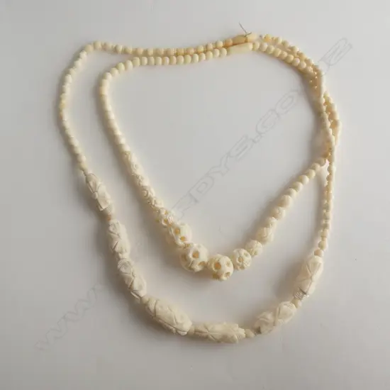 TWO CARVED  BEAD NECKLACES one a/f